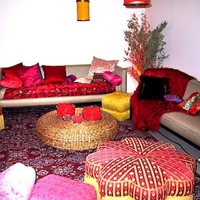A special 'bedroom lounge' was decorated with a sexy, Asian-inspired theme, including a red Oriental carpet, chaise lounges and overstuffed ottomans (all rented from Props for Today) and cocktail tables covered with decorative red-hued linens from A.S.A.P. Linens.