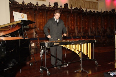 Stephen and Benjamin Lynerd played jazz standards such as 'Fly Me to the Moon' on piano and vibraphone. Synovate sponsored the entertainment.