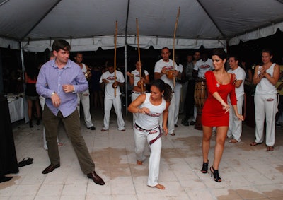 Members from Miami Capoeira Project gave lessons at Saturday night's party atop Red the Steakhouse.