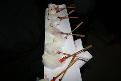 Daniel et Daniel served hors d'oeuvres like grilled tiger shrimp on sugar cane skewers spun with wasabi cotton candy.