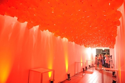 Organizers created a red balloon canopy in the hallway leading to the patio.