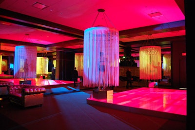 Rob Dittmer of Three Events used white fringe to wrap the chandeliers in the ballroom, which was dressed like Studio 54.
