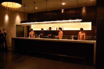 Shirtless bartenders served drinks on the hotel's lower level.