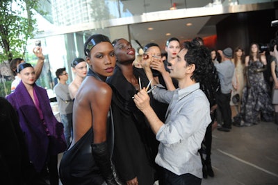 Makeup artist James Kaliardos touched up the models' looks during the cocktail hour's fashion display.