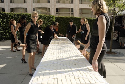 Entering at West 65th Street, guests checked in for the event at a row of tables manned by staffers.