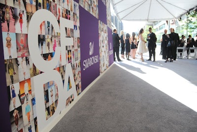 A 90-foot gray carpet marked the arrivals area, and a step-and-repeat, designed by Laird & Partners with the same tiled design used in the event's printed materials, highlighted this year's renewed focus on fashion.