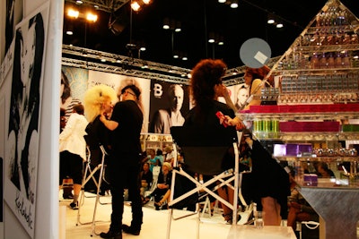 The Tigi creative team demonstrated the company's Catwalk and Bed Head hair products and Bed Head makeup on its models Sunday afternoon on the exhibit floor.