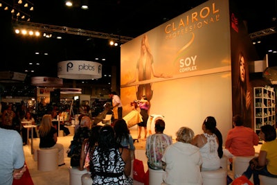 Stylists from Clairol Professional demonstrated blow-drying techniques on the exhibit floor the first day of the show.