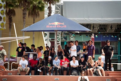 Spectators crowded under Red Bull umbrellas surrounding the skating area to avoid Saturday's 93-degree heat.