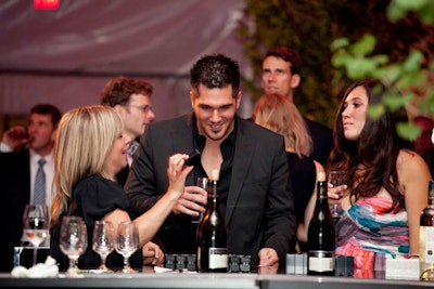 The Bachelorette's Justin Rego took part in a fragrance and wine pairing offered by wine consultant Anne Martin in the V.I.P. lounge.