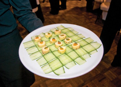 Chicago's Blue Plate dressed up a plain white tray with woven strips of cucumber to serve herb crepes filled with apricots and brie at a gala at the Art Institute in March.