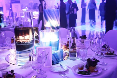 The charity's logo also adorned tabletop vases. Elsewhere in the ballroom, fog machines provided a hazy, ethereal atmosphere.
