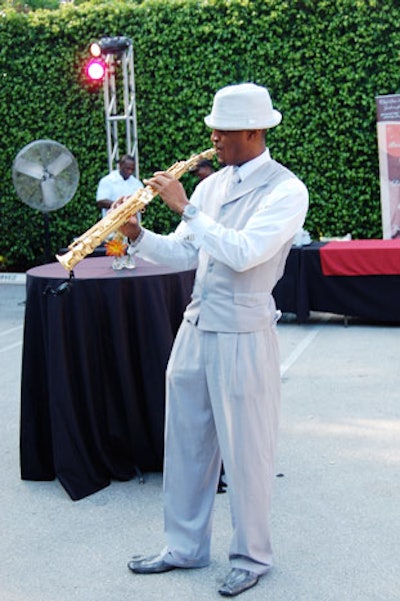 Saxophonist Jon Saxx also entertained during the party.