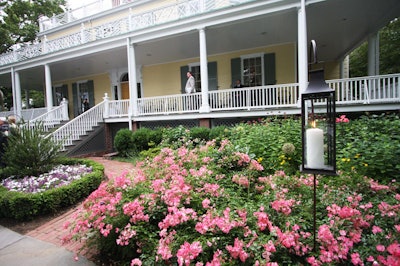 The party took place in Gracie Mansion's flower-filled yard. Guests could wander the home during the event.