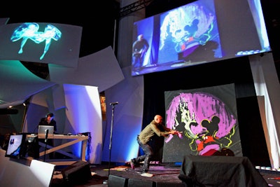 Interactive attractions included a sketch artist station, a main stage featuring Disney fine artist David Garibaldi, and a Toy Story 3-themed photo booth.