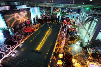 GameSpot's party, produced by the Visionary Group, included heavy branding through gobos, logo pillows and other products, a logo pool table, and a GameSpot sizzle reel playing on large LCD monitors throughout the party, in the lobby, and on the 16th floor of 1010 Wilshire.