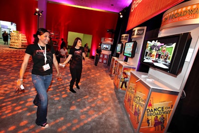 Target's Caravents-produced 'Bullseye Lounge' at E3, in the Concourse Hall Foyer, served as a getaway from the mania in the exhibit halls. A 20-foot video wall looped bull's-eye-inspired graphics, gaming trailers, and guest photos. Attendees also had the chance to play Ubisoft games.