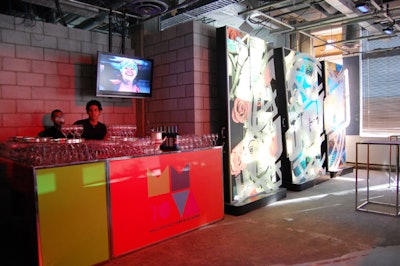 Minimal furnishings were used in the main floor spaces—where servers offered drinks at lime green and orange bars decorated with the 'MMVA 10' logo—in an effort to accommodate the large numbers of guests.