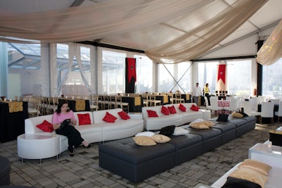 Inside the tent, oversized ottomons, modern couches, and draped sheer fabric lent a lounge-like vibe.