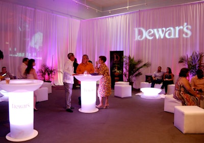 Dewar's created an all-white lounge inside the building adjacent to the pavilion to provide guests with a bit of relief from the summer heat, as well as samples of its products.