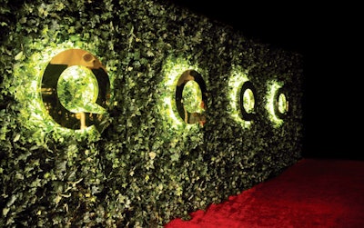 In March, Spec Entertainment designed and produced QVC's Academy Awards-related event at the Four Seasons. Guests paused for photos in front of a leafy hedge studded with the shopping channel's Q logo.