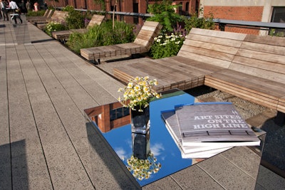 In a nod to the mix of perennials and plants that grow among the High Line's rail beds, the design team topped cocktail tables with bunches of wildflowers.