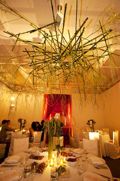 In van Wyck's whimsical take on decor, crisscrossed bamboo shoots formed eye-catching chandeliers. As a way to spruce up one of the smaller rooms, the design team used orange drapes to create a bedouin tent of sorts.