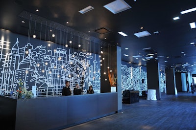 The lobby bar and lounge holds as many as 80 guests and features a hand-painted, three-dimensional mural of Toronto's skyline—measuring 125 by 12 feet—by Spanish artist Javier Mariscal.