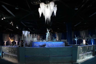 In the reception area, a human fountain served as a focal point within a bar.