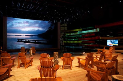The Northern Ontario Oasis featured an indoor lake, a large projection screen with images of cottage country, and a cedar deck where journalists could relax in Muskoka chairs.