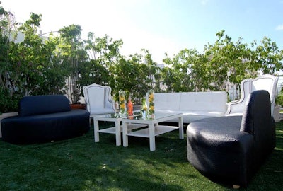 Event organizers mixed the hotel's black and white furniture with mirrored coffee tables from Event Outfitters to create lounge areas on the rooftop.