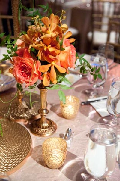 Kehoe event producer Lindsey Lider incorporated orange roses and mokara orchids into the decor.