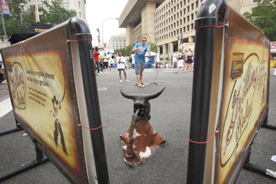 Interactive exhibits, like this lasso game sponsored by Ranchers Reserve Beef, attracted a steady line of guests throughout the weekend.