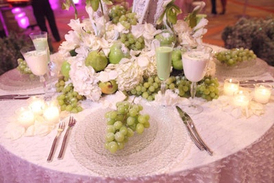 Edge Floral Event Designers used sugared grapes and pears in its centerpiece.