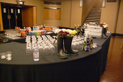 Rubber boots filled with flowers topped the bar in the dining room.