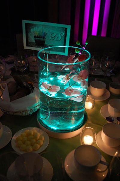 LED lights illuminated the floral arrangements that topped tables in the dining room.