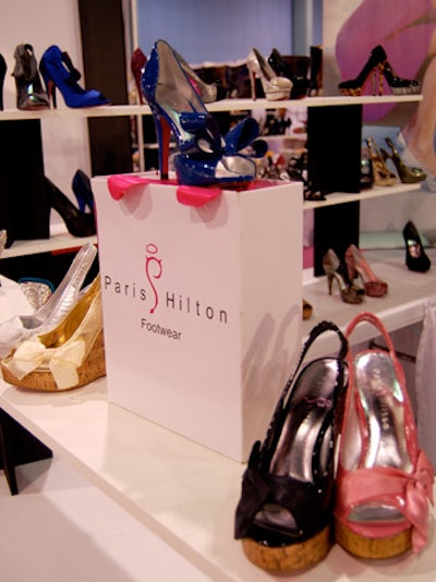 Many exhibitors represented multiple brands, including big names like Paris Hilton, Timberland, House of Dereon, and Guess.