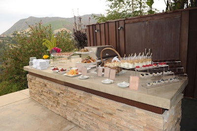 Buffets with catering from Tres L.A. got a clean look with transparent serving pieces.