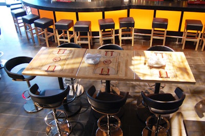 Tables in the Tip Off Bar are made from reclaimed wood from the Toronto Raptors' former basketball court.