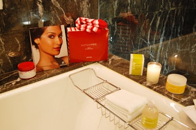 A display in the restroom showcased products like the Pampermint gift box from Arbonne and items from the company's new ginger-citrus collection.