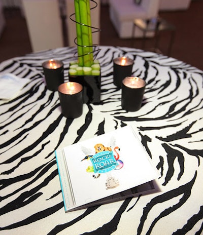 A zebra motif also appeared in the BBJ linens that topped highboy tables. Arena Design created colorful programs.
