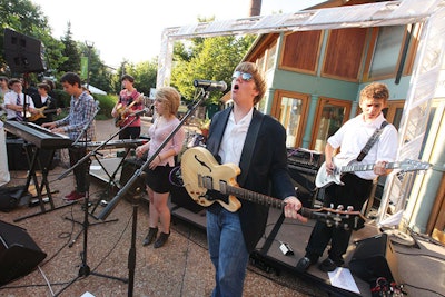 In the main cocktail area, young performers from the School of Rock sang hits from artists such as Queen and Sting.