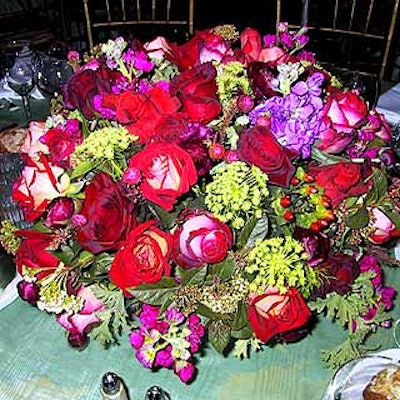 Susan Edgar Design put out centerpieces with red and pink roses.