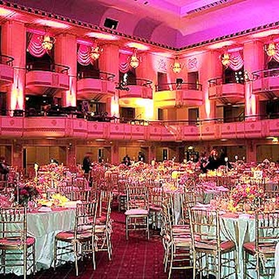 Bestek Lighting and Staging lit the Waldorf=Astoria's grand ballroom in glowing pinks and purples.