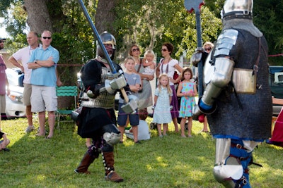 One of the reenactments included two French kings fighting for the lady in waiting.
