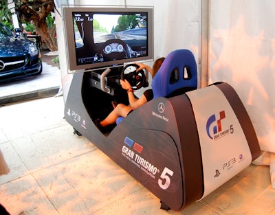 Mercedes-Benz sponsored a Gran Turismo 5 driving simulator as part of its on-site activations at the Raleigh.