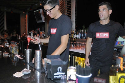 Bartenders sported T-shirts bearing party sponsor Diesel's 'Be Stupid' campaign logo.