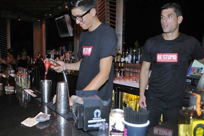 Bartenders sported T-shirts bearing party sponsor Diesel's 'Be Stupid' campaign logo.