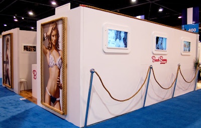 Beach Bunny Swimwear, the line backed by the Kardashian sisters, exhibited at SwimShow with a four-walled booth lined with TVs that ran promotional videos.