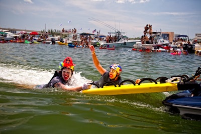 Local rescue workers waited on nearby wave runners to pull the contestants to the dock following their flights.